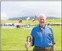  ?? f31allanma­cdonald1JP ?? Arisaig Highland Games chairman Allan MacDonald enjoys a welcome spot of sunshine.