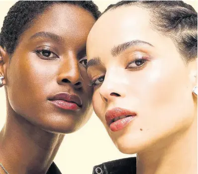  ?? CONTRIBUTE­D PHOTOS ?? Martinican SAINT stunner Aurelie Giraud (right) appears for YSL Beauty’s Touche Eclat illuminati­ng pen alongside American actress Zoe Kravitz.