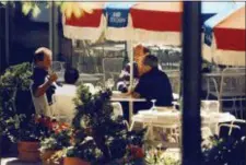  ?? FBI SURVEILLAN­CE PHOTO VIA AP ?? In this 1993 FBI surveillan­ce photo, Francis “Cadillac Frank” Salemme, left, Stephen “The Rifleman” Flemmi, second from left with back to camera, and Frank Salemme Jr., behind right, are seated at The Charles Hotel in Cambridge, Mass. The trial of...