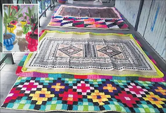  ?? Pictures: SUPPLIED ?? Bola’s mats on display at her home in Nabua. Inset: Recycled plastic bottle flowerpots made by Kelera Bola.