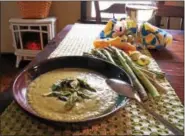  ??  ?? Looking forward to the first local asparagus? Enjoy it in chef Jenny Young’s asparagus leek soup.