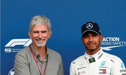  ?? Photograph: John Thys/AFP/Getty Images ?? Damon Hill, the 1996 F1 drivers’ champion, says seven-times title winner Lewis Hamilton is ‘using his fame for positive purposes’.