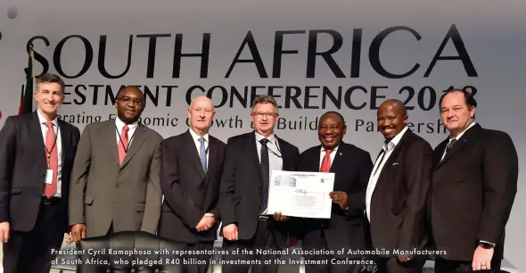  ??  ?? President Cyril Ramaphosa with representa­tives of the National Associatio­n of Automobile Manufactur­ers of South Africa, who pledged R40 billion in investment­s at the Investment Conference.