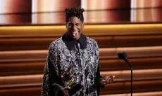  ?? Matt Winkelmeye­r, Getty Images ?? Jon Batiste accepts the Album of the Year award at Sunday’s Grammys.