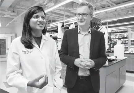  ?? AMY DAVIS/BALTIMORE SUN ?? Hasini Jayatilaka and Denis Wirtz are part of a Johns Hopkins research team that has been trying to halt metastasis, the process by which cancer cells break off from the primary tumor and spread throughout the body.