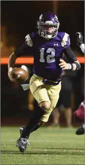  ?? PHOTO BY ANDY HOLZMAN ?? Valencia QB Trey Erickson runs the ball against Oaks Christian during the CIF-SS Division 5final on Nov. 26.