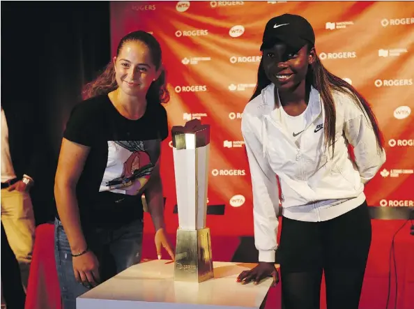  ?? JACK BOLAND ?? French Open champ Jelena Ostapenko, left, and Canadian Francoise Abanda are both 20 and came up the tennis ranks together.