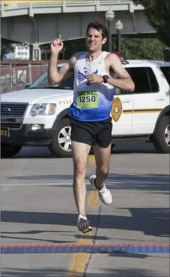  ?? JENNIFER FORBUS — FOR THE MORNING JOURNAL ?? Taking first place overall in the Journal Jog for the second consecutiv­e year was Mark Grogan of Bay Village.