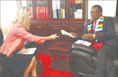  ?? — (Picture by Justin Mutenda) ?? PRESIDENT Mnangagwa receives letters sent by Queen Elizabeth and the Royal family from British Ambassador to Zimbabwe, Ms Melaine II Robinson, at his offices in Harare yesterday.