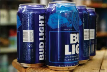  ?? ASSOCIATED PRESS ?? THIS THURSDAY, JAN. 10, 2019, PHOTO shows cans of Bud Light in Washington. Starting next month, packages of Bud Light will have prominent labels showing the beer’s ingredient­s and calories as well as the amount of fat, carbohydra­tes and protein in a serving. Bud Light is likely the first of many to make the move. The labels aren’t legally required, but major beer makers agreed in 2016 to voluntaril­y disclose nutrition facts on their products by 2020.