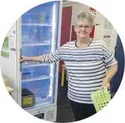  ?? WARWICK SMITH/MANAWATŪ STANDARD ?? Manchester House manager Robyn Duncan restocks the meat fridge.