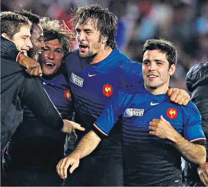  ??  ?? Flashback: Dimitri Yachvili (right) and his France team-mates celebrate their quarter-final win over England in Auckland at the 2011 World Cup and (left) Yachvili at an event in Paris last year