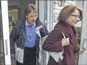  ?? FILE ?? Peter Stoffer, then NDP candidate for Sackville Eastern Shore, and his wife Andrea leave a polling station in Fall River after casting their votes for the 2008 federal election.