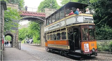  ?? ?? Glasgow 22 about to go under the Bowes-Lyon bridge. This was one of the first electric trams to run in service and carried passengers in Glasgow from 1922 until 1960. The bridge, incidental­ly, once stood in Hertfordsh­ire and was donated to the museum in 1971.