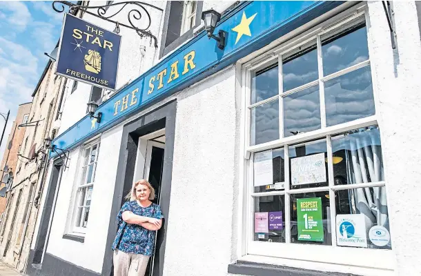  ??  ?? UNFAIR: Morag Douglas of The Star in Burntislan­d feels a discount should have been given as pubs were forced to close. Picture by Steve Brown.