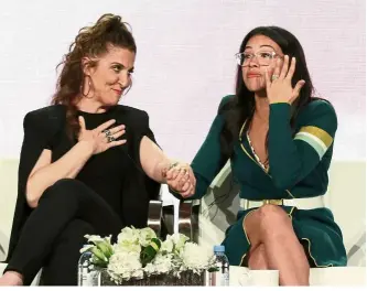  ?? — AP ?? Executive producer Urman (let) and actress Rodriguez getting emotional discussing the final season of the comedy-drama.