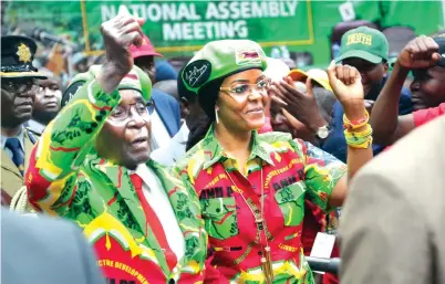  ?? Picture: Believe Nyakudjara ?? ZANU-PF First Secretary and President, Cde Mugabe, and the ruling party’s Secretary for the Women’s League, First Lady Amai Grace Mugabe, acknowledg­e members of ZANU-PF after addressing the National Youth Assembly at the party headquarte­rs in Harare...