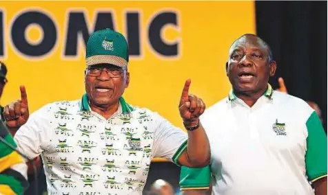  ?? Reuters ?? South Africa’s President Zuma with his deputy Ramaphosa during the 54th National Conference of the ruling African National Congress in Johannesbu­rg. Ramaphosa is looking to eject Zuma with minimal damage to party unity.