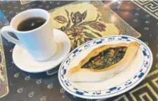  ?? Daliah Singer, Special to The Denver Post ?? Spinach Pie and Mint Tea at Beirut Grill in Englewood.