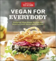  ?? AMERICA’S TEST KITCHEN VIA ASSOCIATED PRESS ?? This image provided by America’s Test Kitchen in May 2018 shows the cover for the cookbook “Vegan For Everybody.” It includes a recipe for quinoa, black bean and mango salad.