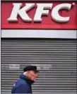  ?? AFP ABEN STANSALL/AFP ?? A pedestrian­s outside a closed KFC fast food store in south London on Monday.