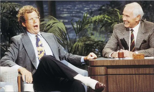  ?? — AP FILES ?? David Letterman, left, appears with Johnny Carson, during a taping of The Tonight Show — the hosting job Letterman aspired to but never attained. After 33 years in late night and 22 years hosting the Late Show with David Letterman, he retires Wednesday.