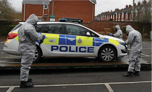  ?? PHOTO: NEIL HALL/EPA ?? POISON FEARS: British military personnel have been removing vehicles in the vicinity of the nerve agent attack on former Russian spy Sergei Skripal.