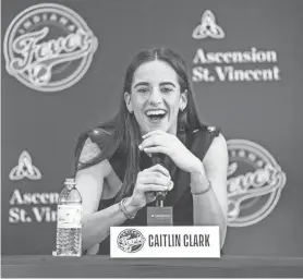  ?? MYKAL MCELDOWNEY/USA TODAY SPORTS ?? Caitlin Clark, the No. 1 pick in the WNBA draft, speaks Wednesday after being introduced by the Indiana Fever.