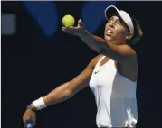  ?? ANDY BROWNBILL / ASSOCIATED PRESS ?? Madison Keys serves during her fourth-round victory over Caroline Garcia. Keys, the U.S. Open runner-up, reached the Australian Open quarterfin­als for the second time in four years.