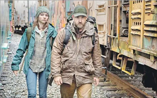  ?? Scott Green Bleecker Street ?? “LEAVE NO TRACE” ponders the war carried home by an Iraq veteran, portrayed by Ben Foster, trying to raise a daughter, played by Thomasin Harcourt McKenzie.