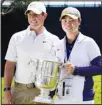  ??  ?? 2021 U.S. Women’s Open golf champion Yuka Saso, of the Philippine­s, poses with her champions trophy with Rory McIlroy, of Northern Ireland, during a practice round of the U.S. Open Golf Championsh­ip, on June 15, at Torrey Pines Golf Course in San Diego. (AP)