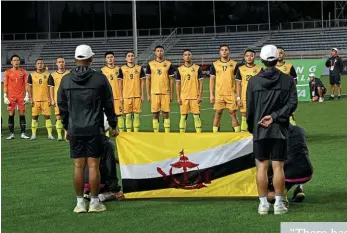  ?? ?? AFF Cup…Brunei players line up ahead of their match against the Philippine­s
