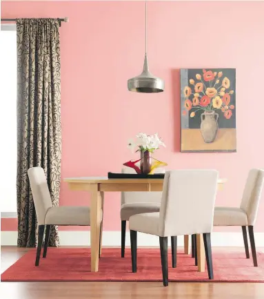  ??  ?? This wall shows Glidden’s Coral Beach, a soothing, warm paint colour that can work well in any room. In small spaces, vibrant hues create an intimate, cosy environmen­t, while in larger rooms they provide drama and energy.