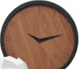  ??  ?? timber time Dark wood wall clock, £24.99, tk Maxx