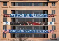  ?? Stefani Reynolds / Getty Images ?? A sign welcoming the new president and vice president is displayed on a building near Freedom Plaza in Washington. Security in the capital has been stepped up.