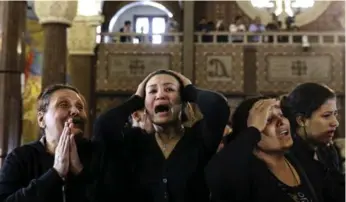  ?? SAMER ABDALLAH/THE ASSOCIATED PRESS ?? At least 17 people were killed at St. Mark’s Cathedral in Alexandria, the historic seat of Christendo­m in Egypt.