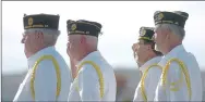  ?? HEATH SAMPLES ENTERPRISE-LEADER ?? Several members of the American Legion Post 29 out of Siloam Springs salute the flag at Bethesda Cemetery during the veterans memorial dedication last Saturday. The cemetery is located near Lincoln.