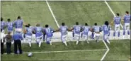  ?? PAUL SANCYA — THE ASSOCIATED PRESS FILE ?? In this file photo, Detroit Lions players take a knee during the national anthem before an NFL football game against the Atlanta Falcons in Detroit. President Donald Trump’s feud with the NFL about players kneeling during the national anthem is the...