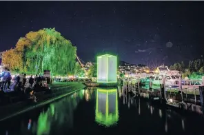  ?? PHOTOS: SUPPLIED ?? Light show . . . A temporary structure on Lake Wakatipu was lit up as part of the launch of the new Xbox gaming console.