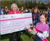  ?? ?? Dozens of pupils turned out to cheer Hollie and, right, with Christine Griffiths and Jackie Boots from The Pink Place