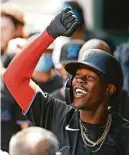  ?? ANDY MARLIN/USA TODAY SPORTS ?? Marlins second baseman Jazz Chisholm Jr. is congratula­ted in the dugout after hitting a home run against the Mets on Saturday.