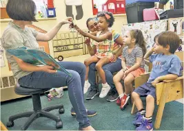  ??  ?? A summer preschool class at the Esther Ashkenas Central Park Early Learning Center, one of NYC’s six AHRC schools.