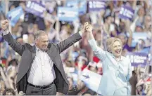  ?? MARY ALTAFFER/ASSOCIATED PRESS ?? During a rally in Florida, Democratic candidate Hillary Clinton introduced running mate Sen. Tim Kaine as “a progressiv­e who can get things done.”