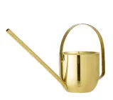  ??  ?? Gold stainless-steel watering can, £53, Cult Furniture