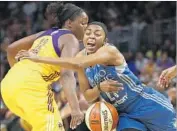  ?? Gina Ferazzi Los Angeles Times ?? RENEE MONTGOMERY and the Lynx beat Chelsea Gray and the Sparks to force WNBA Finals Game 5.