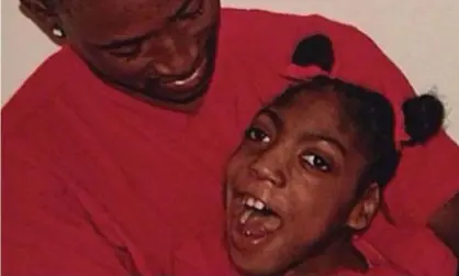  ??  ?? Timesha Beauchamp with her brother Steven Thompson in Southfield, Michigan. She had cerebral palsy and several other medical issues. Photograph: Erica Lattimore/AP