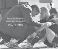  ?? (Photo : M. H’MIMA) ?? Farouk Ben Mustapha : concentrat­ion totale avec son entraîneur Adel Zouita