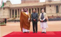  ??  ?? WELCOME CEREMONY: Saudi Crown Prince Mohammed bin Salman bin Abdulaziz Al Saud, left with Indian President Ram Nath Kovind, centre, and Prime Minister Narendra Modi at Rashtrapat­i Bhavan, New Delhi on February 20, 2019.