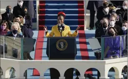  ?? PATRICK SEMANSKY — THE ASSOCIATED PRESS ?? National youth poet laureate Amanda Gorman recites her inaugural poem during the 59th Presidenti­al Inaugurati­on at the U.S. Capitol in Washington on Wednesday.