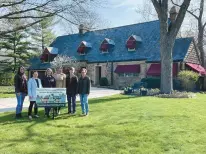  ?? FLOSSMOOR SERVICE LEAGUE ?? Julie Lawton, from left, Flossmoor Mayor Michelle Nelson, Julie Smith, Jane Baffes, Tammy Ciambrone and Ann Mithcell gather in front of one of the homes that will be showcased Wednesday as part of the Flossmoor Service League House Walk.